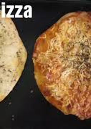 A picture of Pizza and garlic bread.