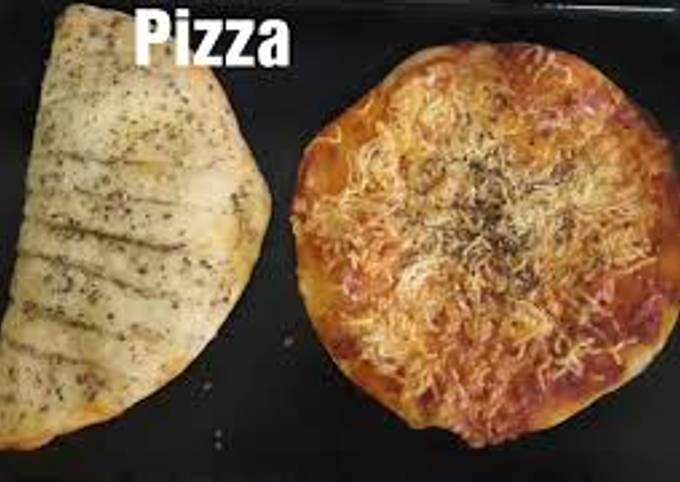 Steps to Make Ultimate Pizza and garlic bread