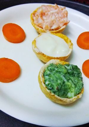 A picture of Edible Corn Canapes with Tricolor Rabdi.