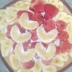 A picture of Heart shaped orange and watermelon.