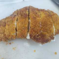 A picture of Chicken katsu melted cheese.