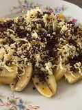 Banana in cheese n cocoa sprinkles