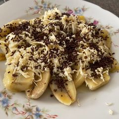 Banana in cheese n cocoa sprinkles A picture of Banana in cheese n cocoa sprinkles.