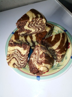 A picture of Chocolate cake with zebra strips.