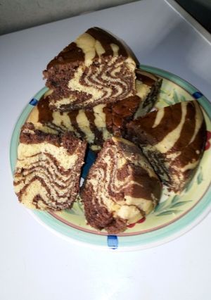 A picture of Chocolate cake with zebra strips.