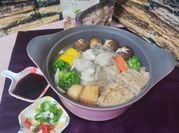 A picture of seafood soup base