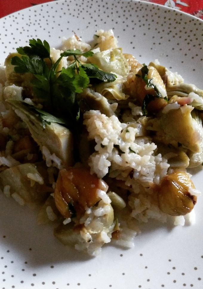 Una foto de Arroz con al alcachofas y castañas