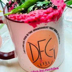 A picture of Suji Dhokla in mug.