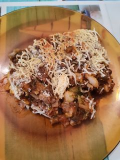 Una foto de Coliflor, brócoli y berenjena gratinada