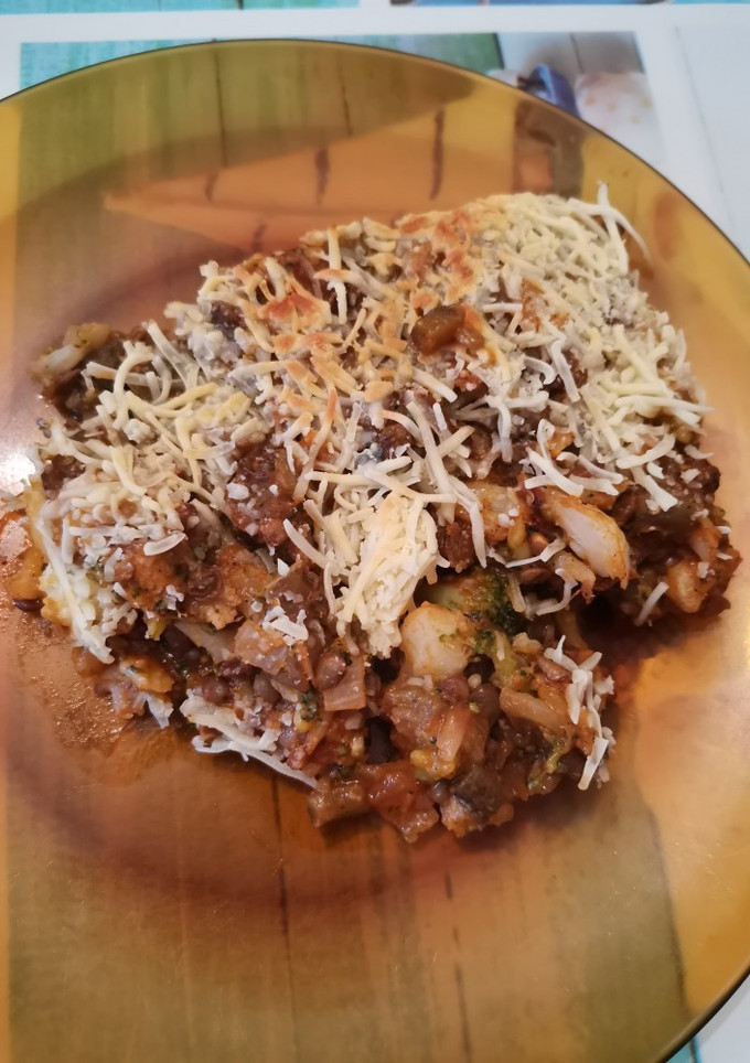 Una foto de Coliflor, brócoli y berenjena gratinada