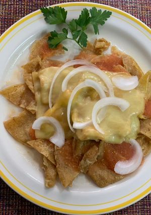 A picture of Chilaquiles with Red Sauce.
