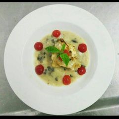 Pan Fried Chicken with Mushroom Veloute Sauce A picture of Pan Fried Chicken with Mushroom Veloute Sauce.