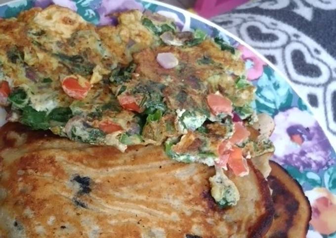 Blueberry banana pancakes with spinach omelet