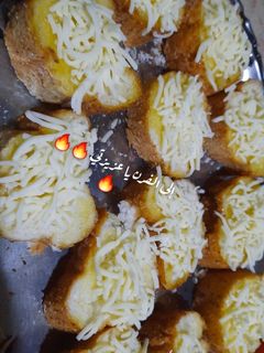 صورة لوصفة خبز بالتوم والزبده