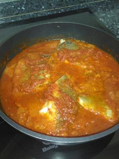 Una foto de Bacalao con tomate