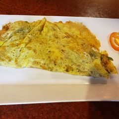 Chicken stuffed omlette A picture of Chicken stuffed omlette.