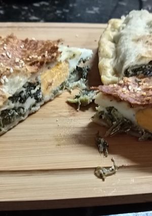 Una foto de Pascualina de acelga con ricotta y verdeo