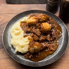 A picture of Beef & Guinness Stew with Dumplings.
