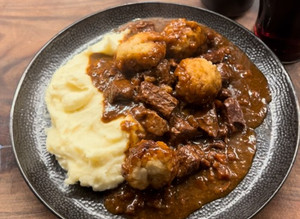 A picture of Beef & Guinness Stew with Dumplings.