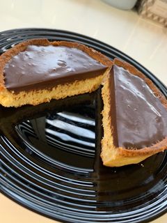 Une photo de Tartelette chocolat 🍫 noix de coco 🥥