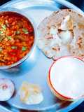 Healthy tasty fiber rich moong dal and turai sabji and millet flour roti