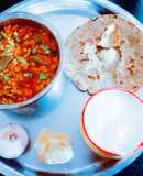Healthy tasty fiber rich moong dal and turai sabji and millet flour roti