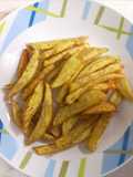 Papas fritas saborizadas con merkén y orégano