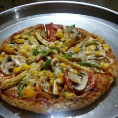 A picture of Veggie farm Pizza.