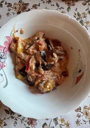 A picture of Eggplant peppers and tomatoes.