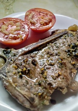 Una foto de Bife con chimichurri