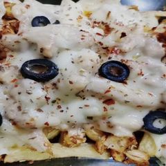 A picture of Pizza fries.