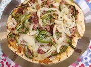 A picture of canned corned beef with onions