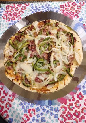 A picture of Corned Beef and Onion Pizza.