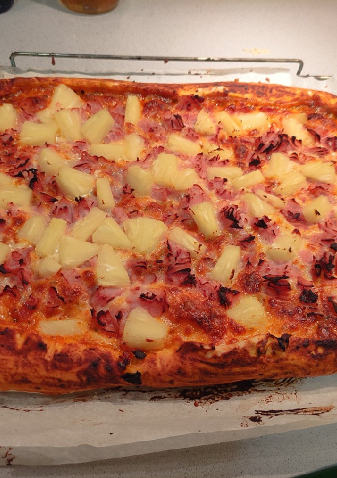 Una foto de Pizza hawaiana