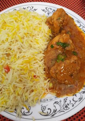 A picture of Fried rice with dahi chicken.