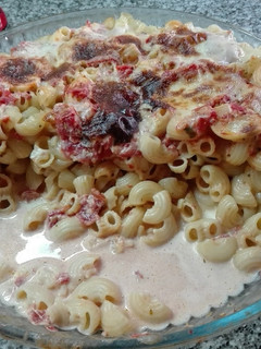 Una foto de Fideos gratinados con salsa mixta