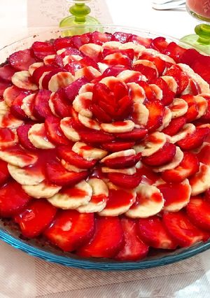 Une photo de Tarte aux fraises et banane🍌🍓