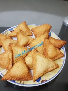 صورة لوصفة مثلثات السميد بالجبنة 👌👍
