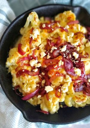 A picture of Skillet Cauliflower Cheese With Caramelised Red Onions.