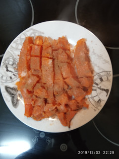 Una foto de Batata al horno con azúcar y canela