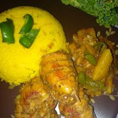 A picture of Vegetables cous cous with chicken and cabbage soup.