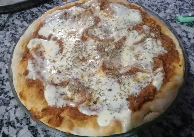 masa para pizza fina con aceite de oliva redonda