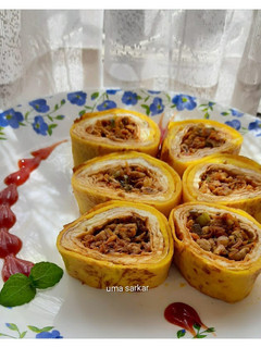 A picture of Chicken stuffed egg roll.