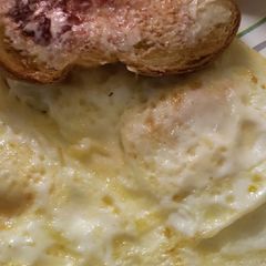 A picture of Over medium eggs.