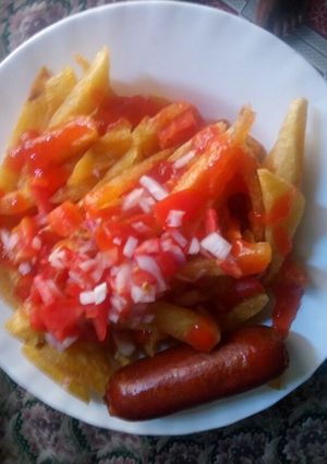 A picture of Fried chips with smokies and kachumbari#authormarathon.