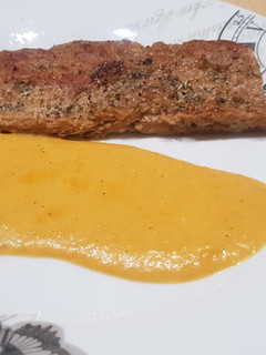 Una foto de Seitán y salsa naranja tm5