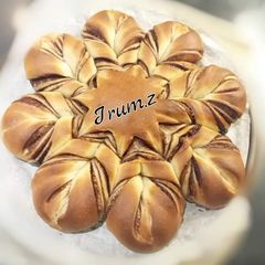 A picture of 🥐🍫Braided Nutella Bread🍫🥐.