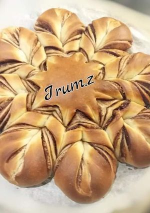 A picture of 🥐🍫Braided Nutella Bread🍫🥐.