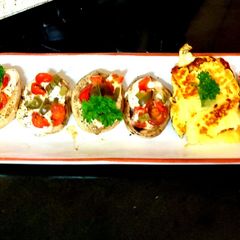 A picture of My Tomato + Basil Bruschetta Stuffed Mushrooms 🥰.