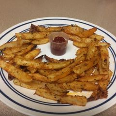 A picture of Potato wedges.